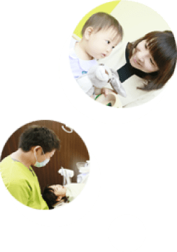 診療中の院長と保育士
